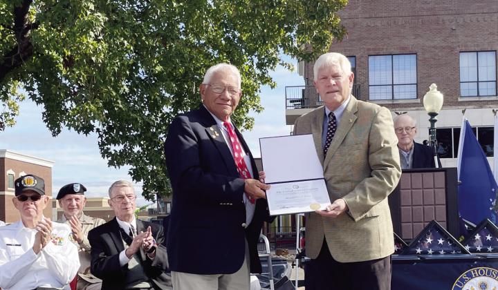 U.S. Rep. Pete Sessions, R-17th District of Texas, presents Arnold Gray of Groesbeck with a Congressional Veteran Commendation last month. Courtesy Photo