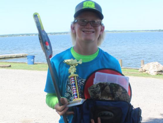 Bo Self reeled in eight fish at the Kid Fish Derby at Lake Limestone on Saturday morning to win the Most Caught Fish trophy. Bo will be in the 8th Grade at Teague Junior High. Photo by Mitchell Pate