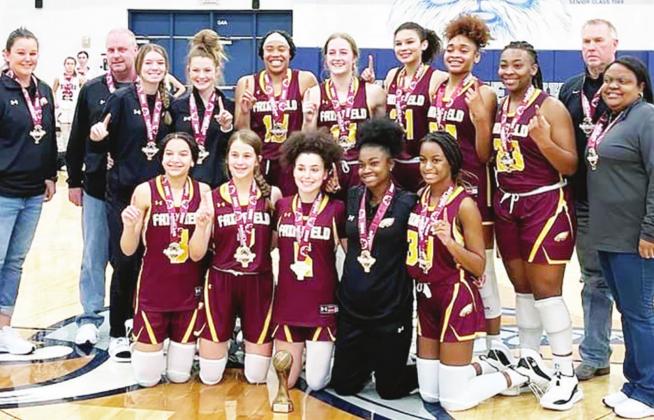 The Lady Eagles brought home the gold trophy from the Aggieland Tournament this past week. Front row, from left, are Jarahle Daniels, Addie Cox, Jalynn Calloway, Charlee Brackens and Jimiluyah Nash; back row, Coach Sally Whitaker, Coach Dennis Johnson, Addison Posey, Cooper Lawley, Breyunna Dowell, Avery Thaler, McKinna Brackens, Shadasia Brackens, Emori Davis, Coach Randy Barger and Coach Tarsha Graves.