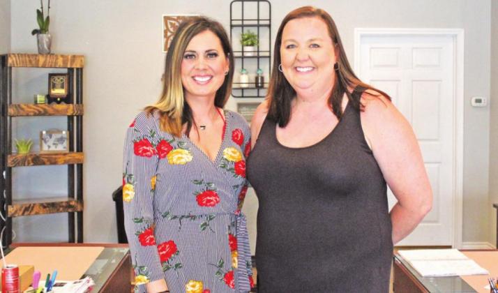Rachel Conaway with Premier Realty and Stacey Bell with Prestige Insurance are open and ready to serve Freestone County as well as the surrounding counties. Photo by Mitchell Pate