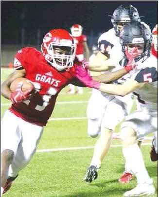 FAR LEFT: Groesbeck’s Ma’Qua Smith runs for yardage against West on Friday night. The Goats were beaten, 33-14. It was their second loss in District 9-3A, Division I play.