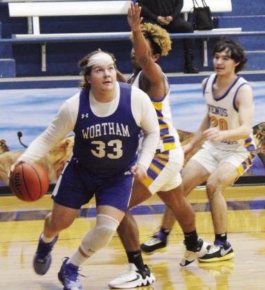 Wortham forward Cash Perez drives toward the basket during a recent game. Photo by Jason Chlapek/Fairfield Recorder