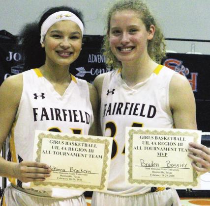 BELOW: Award winners McKinna Brackens (left, All-Tournament Team) and Braden Bossier (right, All-Tournament Team MVP) are nothing but smiles after helping lead the Lady Eagles to a Regional title.