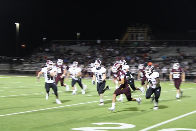 Kaden Crawford (#5) uses his legs to take off against the Hornets.
