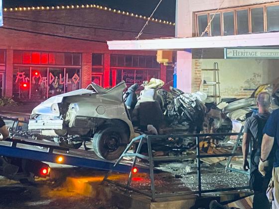 A vehicle, traveling at a high rate of speed early Saturday, Oct. 8, crashed into the Heritage Title building.