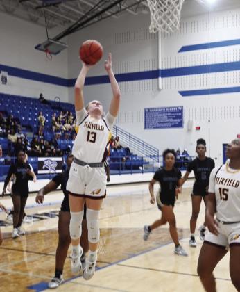 Avery Thaler scores a basket for the Lady Eagles in the Bi-District Championship against Rockdale. Thaler led the way for Fairfield with 20 points. Photo by Mitchell Pate/ Fairfield Recorder