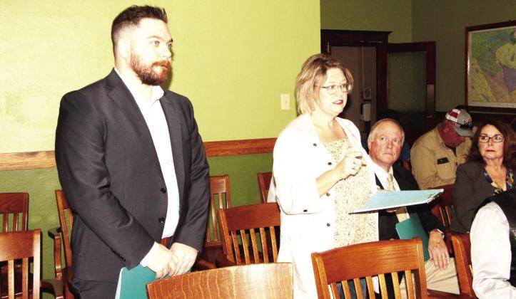 District Court Coordinator Misty Lewis introduces Presley Meyer, regional sales representative for JAVS (Justice Audio Visual Solutions), who made a presentation about how a proposed new audio system would improve the district courtroom. Photo by Roxanne Thompson/Fairfield Recorder