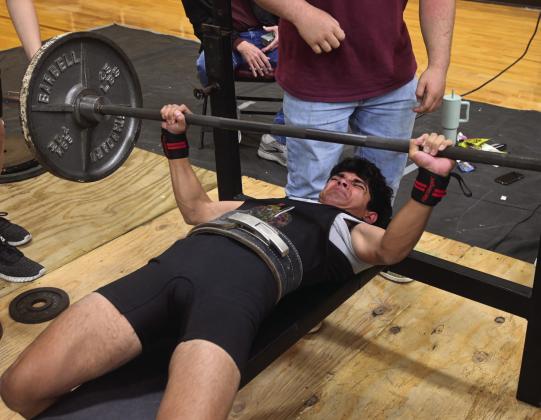 LEFT: Gage Wendt grabs first place in the 123 division with a squat of 360 pounds, bench press of 195 pounds, and deadlift of 335 pounds. RIGHT: Jose Gutierrez takes first place in the 114 class with a squat of 375 pounds, bench press of 205 pounds, and deadlift of 335 pounds. Photos by Mitchell Pate/Fairfield Recorder
