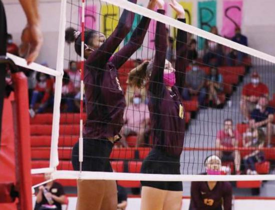 Essence Watkins and Alyssa Whitaker form a wall at the net. Angela Crane/For The Fairfield Recorder