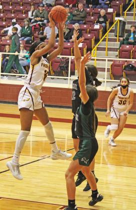 Essence Watkins makes a jump for a shot against Franklin Tuesday evening. Photo by Shelly Pope