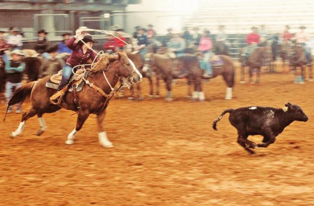 Fairfield High School senior Rheagan Cotton (above) competes in rodeo events for THSRA. Photo by Mitchell Pate