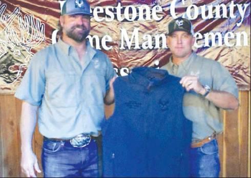 Scott Isaacs (right), pictured with Freestone County Game Management Association treasurer John Hill (left), was the adult winner at FCGMA’s recent Jimmy Brown Big Buck Contest. Youth winners were also handed out during the night, as was the Big Eight Contest Winner, Emery Black. Photo by Emery Black.