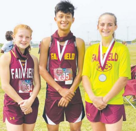 Emma Jo Smith (left), Eli Castillo (middle) and Madox Mitchael (right) competed in the Pro-Fit Heritage Invitational in Belton this past week, and will be running in the Golden Eagle Run on home soil Saturday. Contributed Photo
