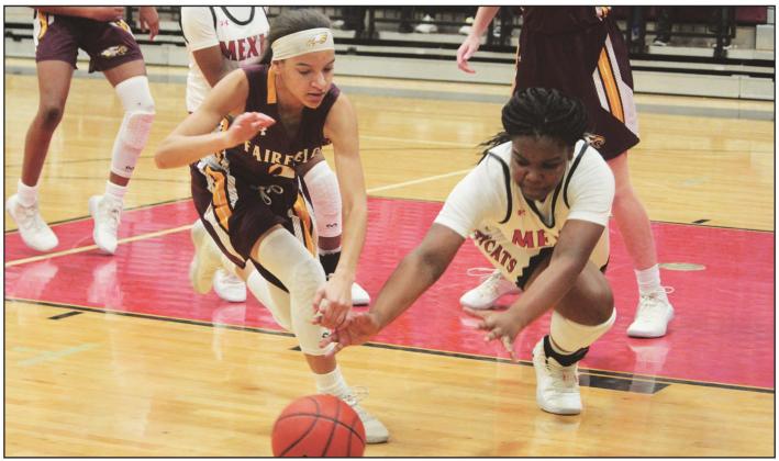Ultimate Hustle: Fairfield’s Jarahle Daniels (left) chases a loose ball with Mexia’s Michaiah Miller (right) during a District 19-4A game in Mexia on Tuesday, Jan. 21.