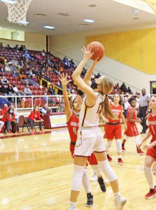 Freshman Avery Thaler shoots a basket for the Lady Eagles on Friday night against Groesbeck. Photo by Mitchell Pate