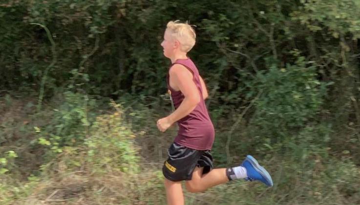 Collen Loviette (above) had some fun on the course this season with Fairfield Junior High cross-country. The Eagles and Lady Eagles finished their respective seasons on Oct. 13. Contributed Photo