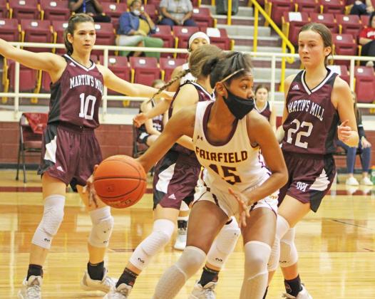 Fairfield’s Essence Watkins (15) looks to move with the ball in a game against Martin’s Mill at the Johnson Activity Center on Tuesday, Dec. 29. Photo by Skip Leon/For The Fairfield Recorder