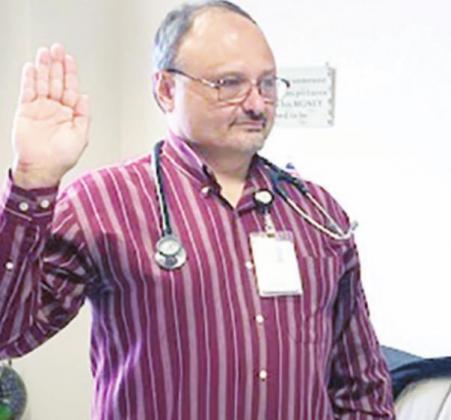 Dr. Joseph Berger takes oath of office as Freestone county health authority.