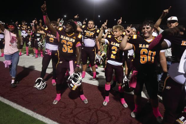 The Fairfield Eagles are all smiles on Friday night during the school song after taking a 22-15 victory over the Mexia Blackcats. Photo by Mitchell Pate/Fairfield Recorder