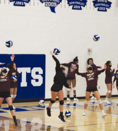 The Lady Eagles go through warmups before their Bi-District match. Photo by Thomas Leffler