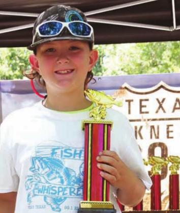 Bowen Urban won the biggest stringer trophy for catching 19 fish during Kid Fish.