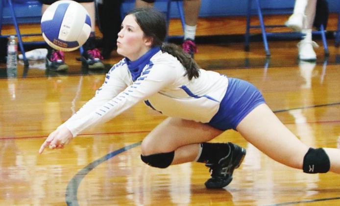 Wortham’s Grace McCoslin dives to return a hit during the Lady Bulldogs’ district-opening victory over Axtell on Friday. McCoslin had 12 digs in the five-set match. Photo by Jennifer Lansford/For The Mexia News