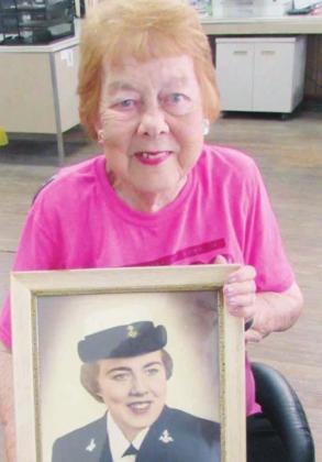 Freestone County resident Bettye Trask is a United States Navy veteran. June 12 is Women Veterans Day. In the photo Bettye is holding a picture of herself following her enlistment in 1961. She served two years. Photo by Curtis Burton/ The Fairfield Recorder
