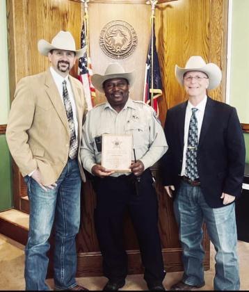 Deputy Larry Jones is recognized as the Freestone County Sheriff Office Employee of the Year for 2023 by Freestone County Sheriff Jeremy Shipley and Chief Deputy Devin Mowrey. Courtesy Photo