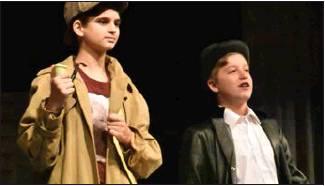 Top actors Benjamin Kilkenny as Sherlock Holmes, (left) and Mason Edwards as Watson stay in character for photos. Kilkenny won Best Actor at District One-Act Play competition, and Edwards was named to All-Star Cast.