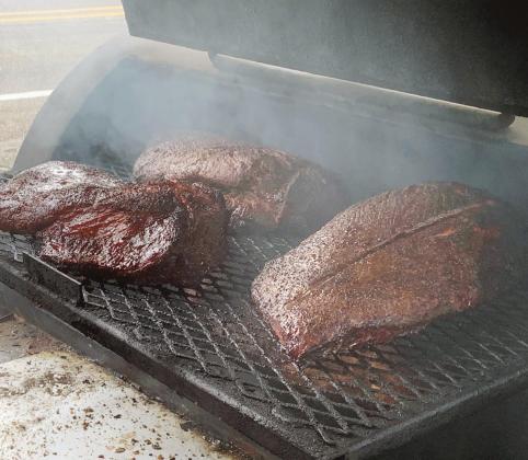 Monte Atchely’s brisket is looking good for Dad’s BBQ’s first day of business on July 22. Photo by Mitchell Pate/Fairfield Recorder