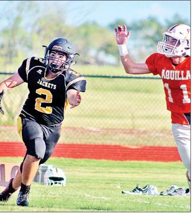 Coolidge’s Eric Walker (2) looks to make a reception during a scrimmage earlier this season. Walker scored on a long touchdown run in the Yellowjackets’ 62-54 loss at Weatherford Christian on Friday night. File photo by Skip Leon/The Mexia News
