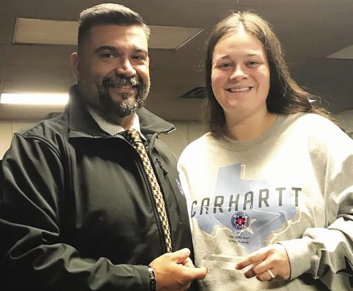 Billy Perez (left), director of Fairfield Ambulance Services, presents Ashley Kennedy with the Star of the Year award. Courtesy Photo