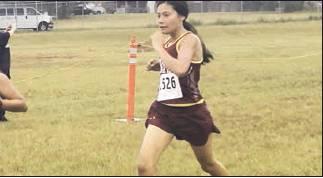 Calm under pressure: With opponents trailing during Tuesday’s District meet, Eagles Freshman Arly Salazar stays cool at the finish. Photo by Skip Leon/The Mexia News