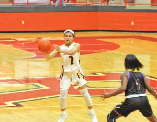 Senior guard Jada Clark (above) gets the offense started during the Lady Eagles’ 73-34 Bi-District victory Monday night. Photo by Thomas Leffler