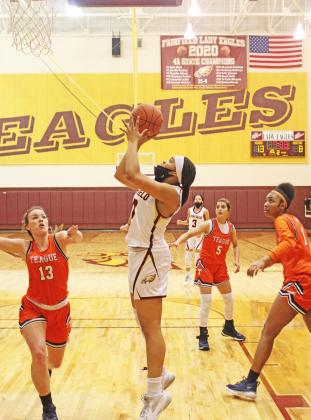 Junior Breyunna Dowell shoots a basket for the Lady Eagles against Teague. Photo by Mitchell Pate