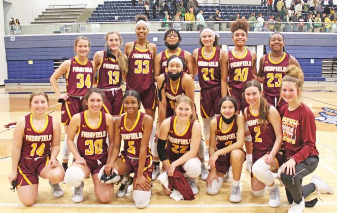 The Lady Eagles claimed the Region III - 3A title on Tuesday night after defeating Lexington 65-29 in the Regional Finals to head to the Final Four. Pictured are (back) Addie Cox, Avery Thaler, Essence Watkins, Te’Yalla Simpson, McKinna Brackens, Shadasia Brackens, Emori Davis, (middle) Breyunna Dowell, (front) Kaylee Billock, Jenny Pina, Charlee Brackens, Makensy Isaacs, Jarahle Daniels, Ally Robinson, and Cooper Lawley. Photo by Mitchell Pate