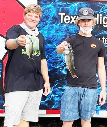 Monty Morgan and Wilson Basden weigh in two fish totaling 2.45 pounds. Contributed Photo