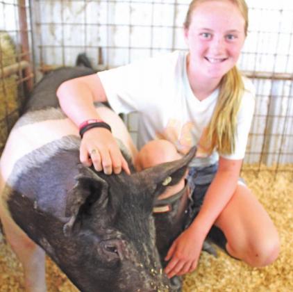 Dawson and Ellie Grissett are ready to show their goats, Cletus and Haggard, at the 2020 Freestone County Fair this month.