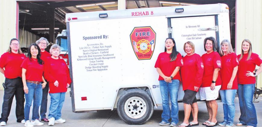 The Fairfield Fire Auxiliary is pictured with a new trailer donated by Calvary Baptist Church. Pictured are Jeannie Keeney, Linda Mowrey, Janice McCalman, Cynthia Pruitt, Emma DeAnda, Doris Sneed, Lisa Baggerly, Lecia Brooks, and Courtney Blair. Photo by Mitchell Pate