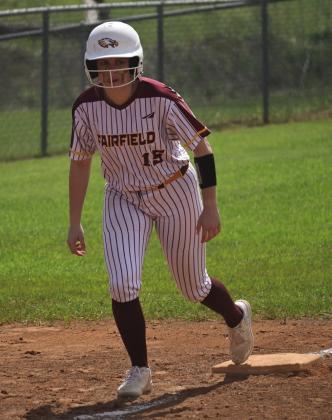Delaney McGowan watches the ball closely from third base so she can take her lead towards home plate. Photo by Mitchell Pate/Fairfield Recorder