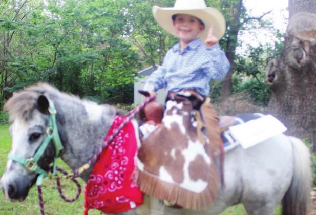 Four-year-old Jesse Taylor, the son of Celeste Crowhurst, was named the Best Dressed Cowboy at the Back in the Saddle Again Parade for the 2021 Freestone County Fair.