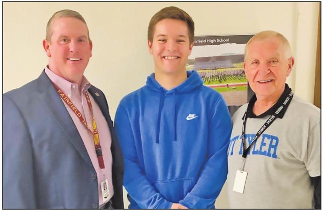 Fairfield senior David Thomas (center), pictured with FISD Superintendent Dr. Jason Adams (left) and Grand Band director Mr. Bill Large (right), earned All-State band honors for the second straight year.
