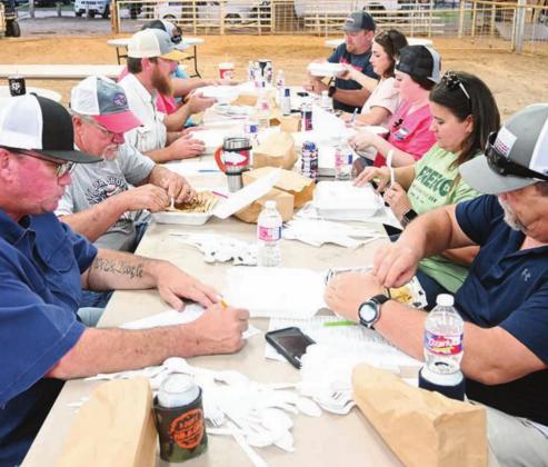Judges taste the food for the cook-off at the 1st Annual Freestone County Go Texan BBQ Cook Off on Friday night, April 29. Photos by Mitchell Pate/Fairfield Recorder