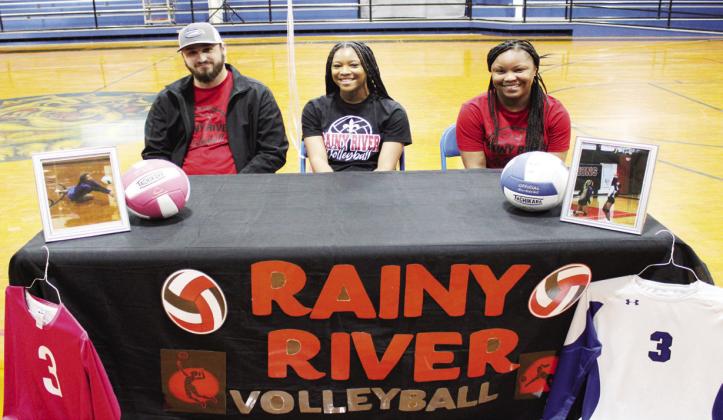 Ameeya Rhodes (center) is surrounded by her parents Collin (left) and Ashley Brooks as she signs with Rainy River Community College in International Falls, Minnesota to play volleyball on Monday at Wortham High School. Photo by Jason Chlapek/Fairfield Recorder