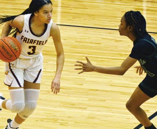 Jarahle Daniels makes her way down the court for Fairfield against Huntsville. Photo by Mitchell Pate/Fairfield Recorder