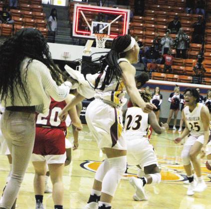 ABOVE: The excitement was palpable at the buzzer of the Regional Final, as the Lady Eagles’ mission to States was complete.