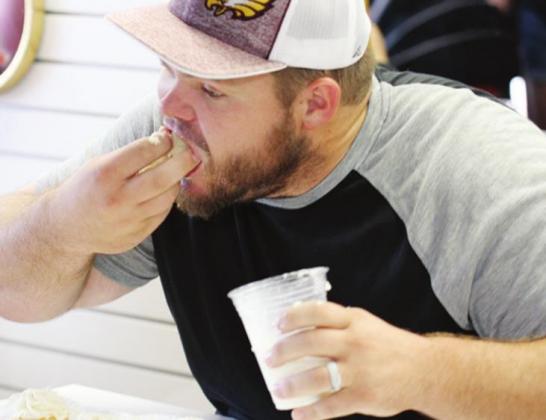 With unbeatable technique and flawless form, Jacob Pratt of Fairfield took home top honors at the Peach Cupcake Eating Contest last year. Mommacakes will again be sponsoring the event. File photo/Fairfield Recorder