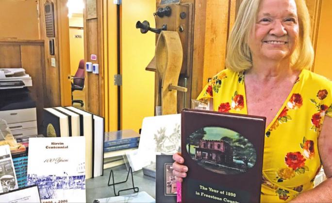 Freestone County author Nancy Rula pictured with her various works. Photo by Mary Cryer Awalt