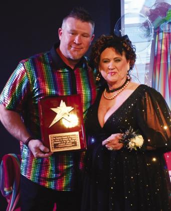 Jason Pate earns the Ambassador of the Year Award at the Fairfield Chamber of Commerce banquet in January. Gail Farish presents Pate with the honor. Photo by Mitchell Pate/Fairfield Recorder