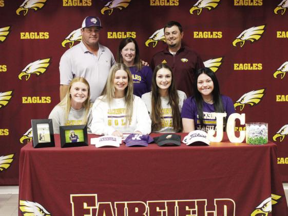 Allie Hughes (seated second from left) recently signed to play golf at Jacksonville College. Hughes was joined by family and friends during the event. Photo by Jason Chlapek/Fairfield Recorder